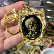 “Skull of a Skeleton with Burning Cigarette" Van Gogh  Keychain