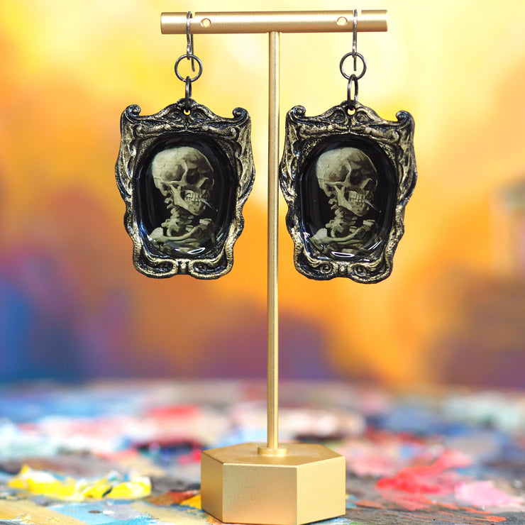 “Skull of a Skeleton with Burning Cigarette” Van Gogh Earrings