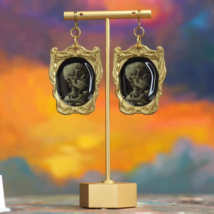 “Skull of a Skeleton with Burning Cigarette” Van Gogh Earrings